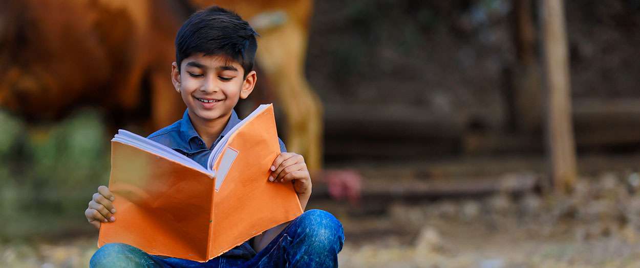cute-indian-child-reading-his-book